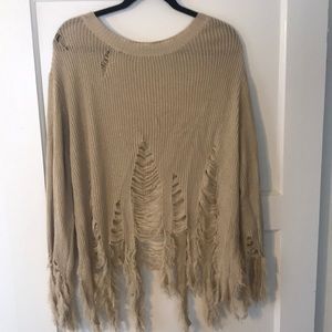 Cream “ripped” sweater